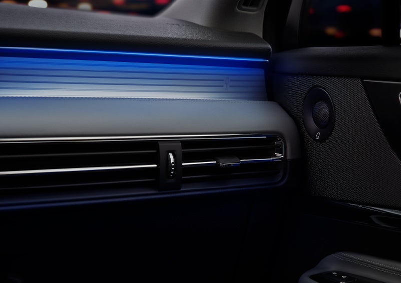 A thin available ambient blue lighting illuminates the pinstripe aluminum under an ebony dashboard, emitting a cool energy | Maguire's Lincoln in Palmyra PA