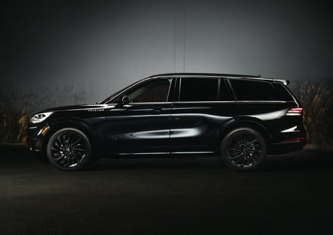 A 2024 Lincoln Aviator® SUV is shown in the Infinite Black exterior color | Maguire's Lincoln in Palmyra PA