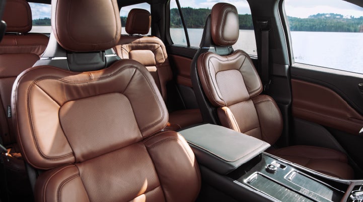 The front row's Perfect Position Seats in a 2024 Lincoln Aviator® Reserve model with Ebony Roast interior | Maguire's Lincoln in Palmyra PA