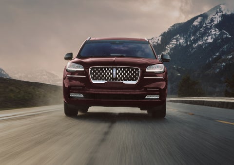 A 2024 Lincoln Aviator® SUV is shown in the Diamond Red exterior color. | Maguire's Lincoln in Palmyra PA