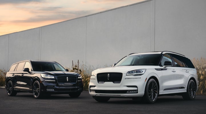 Two Lincoln Aviator® SUVs are shown with the available Jet Appearance Package | Maguire's Lincoln in Palmyra PA