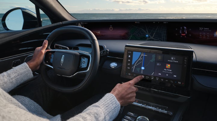 The driver of a 2024 Lincoln Nautilus® SUV interacts with the new Lincoln Digital Experience. | Maguire's Lincoln in Palmyra PA
